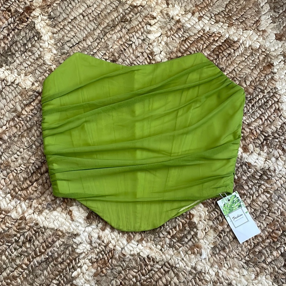 Lime green bustier top. Never been worn. Size M. Boning for maximum holding!